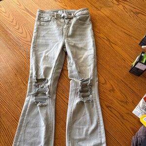 Grey lovervet stretch distressed jeans.